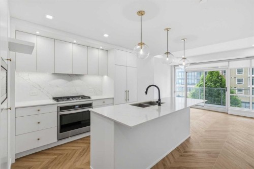 307-8445 Broadcast Avenue Sw, Calgary, AB - Indoor Photo Showing Kitchen With Double Sink With Upgraded Kitchen