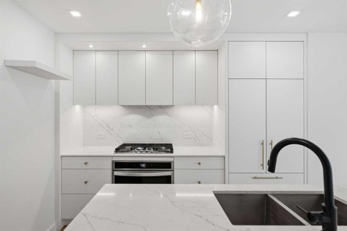 307-8445 Broadcast Avenue Sw, Calgary, AB - Indoor Photo Showing Kitchen With Upgraded Kitchen