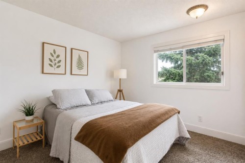 56 Deersaxon Circle Se, Calgary, AB - Indoor Photo Showing Bedroom