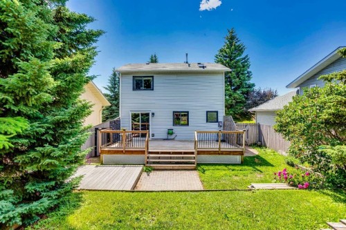 56 Deersaxon Circle Se, Calgary, AB - Outdoor With Deck Patio Veranda