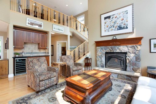 57-39408 Range Road 21, Rural Lacombe County, AB - Indoor Photo Showing Living Room With Fireplace