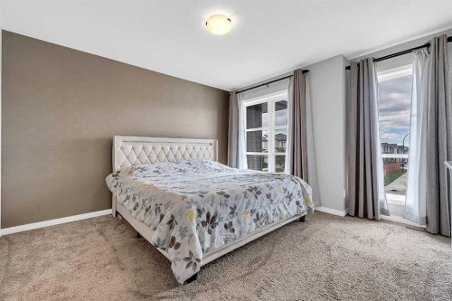 121 Carringvue Park Nw, Calgary, AB - Indoor Photo Showing Bedroom
