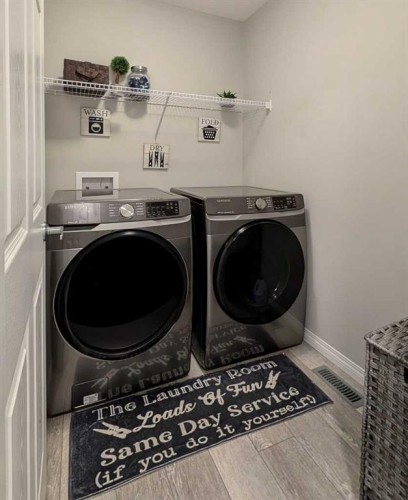 121 Carringvue Park Nw, Calgary, AB - Indoor Photo Showing Laundry Room