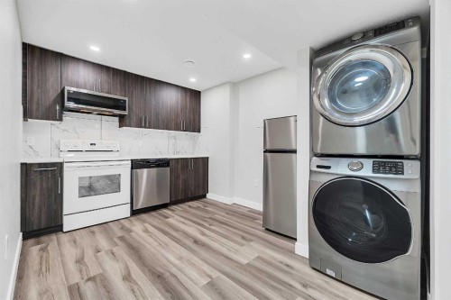 121 Carringvue Park Nw, Calgary, AB - Indoor Photo Showing Laundry Room