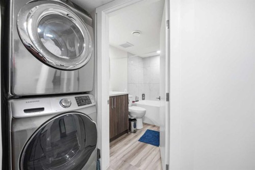 121 Carringvue Park Nw, Calgary, AB - Indoor Photo Showing Laundry Room