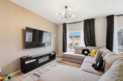 121 Carringvue Park Nw, Calgary, AB - Indoor Photo Showing Living Room