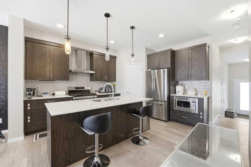 121 Carringvue Park Nw, Calgary, AB - Indoor Photo Showing Kitchen With Upgraded Kitchen