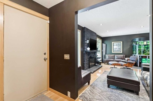 10220 Brookpark Boulevard Sw, Calgary, AB - Indoor With Fireplace