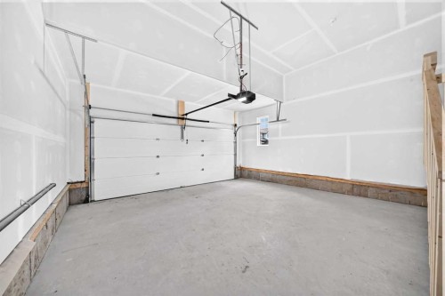 48 Creekside Path Sw, Calgary, AB - Indoor Photo Showing Garage