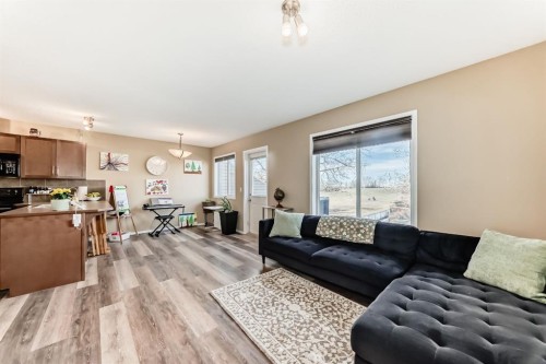 602-800 Yankee Valley Boulevard Se, Airdrie, AB - Indoor Photo Showing Living Room