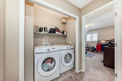 602-800 Yankee Valley Boulevard Se, Airdrie, AB - Indoor Photo Showing Laundry Room