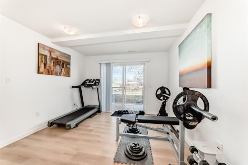 602-800 Yankee Valley Boulevard Se, Airdrie, AB - Indoor Photo Showing Gym Room