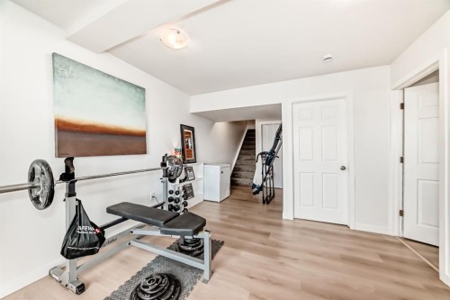 602-800 Yankee Valley Boulevard Se, Airdrie, AB - Indoor Photo Showing Gym Room