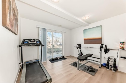 602-800 Yankee Valley Boulevard Se, Airdrie, AB - Indoor Photo Showing Gym Room