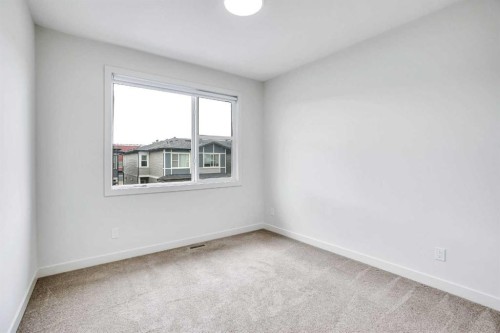 106-116 Saddlestone Heath Ne, Calgary, AB - Indoor Photo Showing Other Room