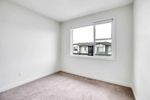 106-116 Saddlestone Heath Ne, Calgary, AB - Indoor Photo Showing Other Room