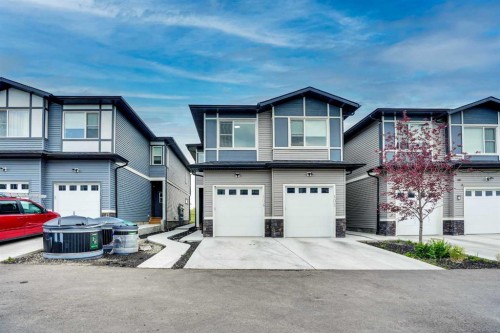 106-116 Saddlestone Heath Ne, Calgary, AB - Outdoor With Facade