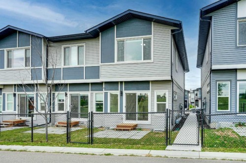 106-116 Saddlestone Heath Ne, Calgary, AB - Outdoor With Facade