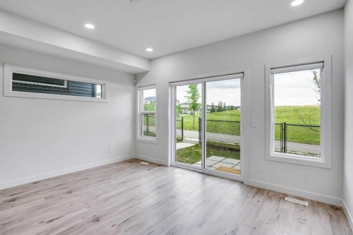 106-116 Saddlestone Heath Ne, Calgary, AB - Indoor Photo Showing Other Room
