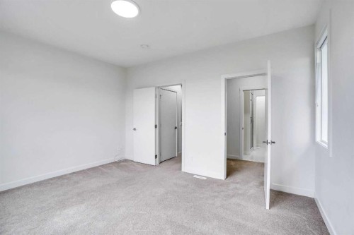106-116 Saddlestone Heath Ne, Calgary, AB - Indoor Photo Showing Other Room