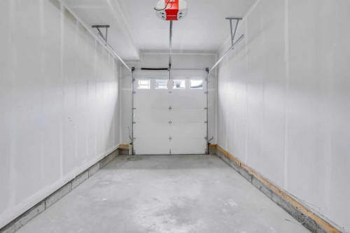 106-116 Saddlestone Heath Ne, Calgary, AB - Indoor Photo Showing Garage