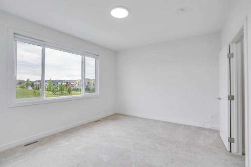 106-116 Saddlestone Heath Ne, Calgary, AB - Indoor Photo Showing Other Room