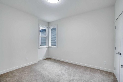 106-116 Saddlestone Heath Ne, Calgary, AB - Indoor Photo Showing Other Room