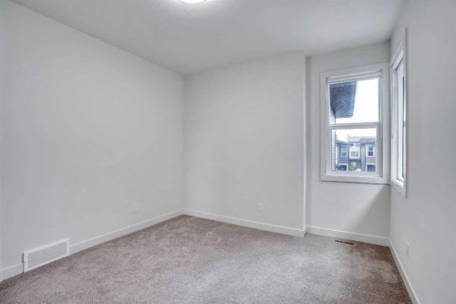 106-116 Saddlestone Heath Ne, Calgary, AB - Indoor Photo Showing Other Room
