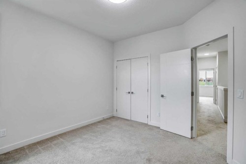 106-116 Saddlestone Heath Ne, Calgary, AB - Indoor Photo Showing Other Room