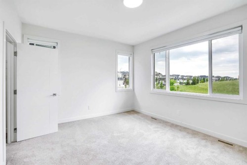 106-116 Saddlestone Heath Ne, Calgary, AB - Indoor Photo Showing Other Room