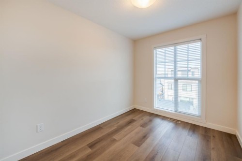 250 Alpine Avenue Sw, Calgary, AB - Indoor Photo Showing Other Room