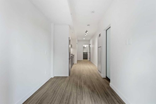 207-730 2 Avenue Sw, Calgary, AB - Indoor Photo Showing Other Room