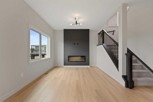 38 Waterford Mews, Chestermere, AB - Indoor With Fireplace