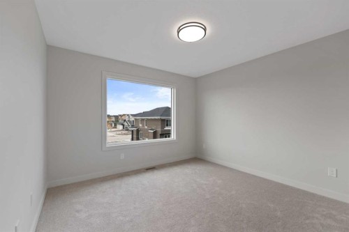 38 Waterford Mews, Chestermere, AB - Indoor Photo Showing Other Room