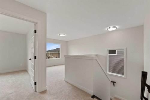 38 Waterford Mews, Chestermere, AB - Indoor Photo Showing Other Room