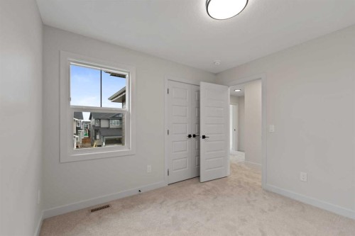 38 Waterford Mews, Chestermere, AB - Indoor Photo Showing Other Room