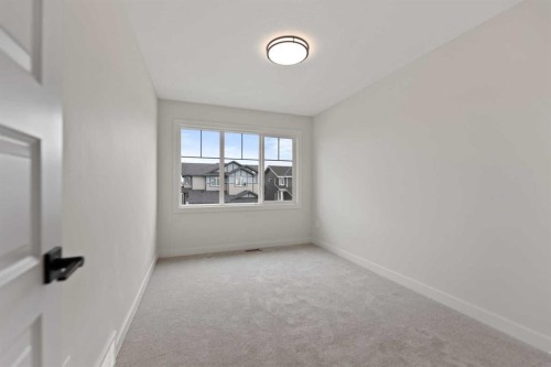 38 Waterford Mews, Chestermere, AB - Indoor Photo Showing Other Room