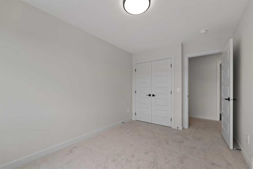 38 Waterford Mews, Chestermere, AB - Indoor Photo Showing Other Room