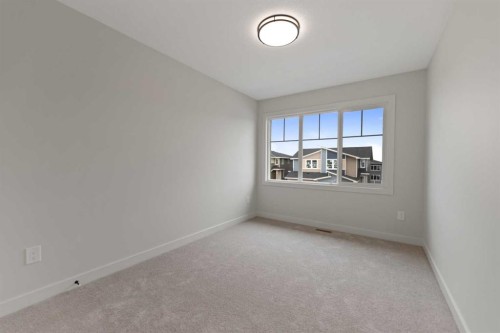 38 Waterford Mews, Chestermere, AB - Indoor Photo Showing Other Room
