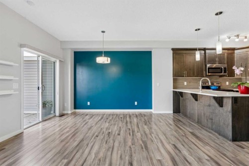 549 Hillcrest Road Sw, Airdrie, AB - Indoor Photo Showing Kitchen With Upgraded Kitchen