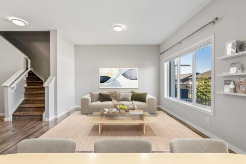 549 Hillcrest Road Sw, Airdrie, AB - Indoor Photo Showing Living Room