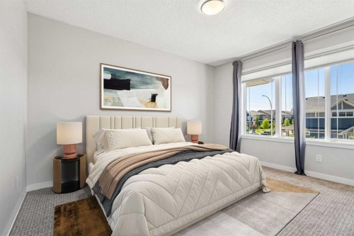 549 Hillcrest Road Sw, Airdrie, AB - Indoor Photo Showing Bedroom