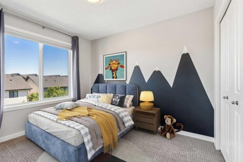 549 Hillcrest Road Sw, Airdrie, AB - Indoor Photo Showing Bedroom