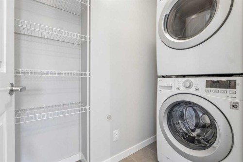 549 Hillcrest Road Sw, Airdrie, AB - Indoor Photo Showing Laundry Room
