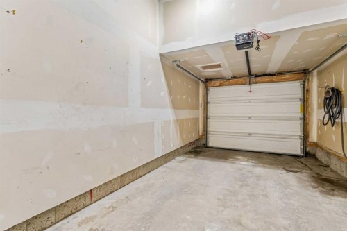 549 Hillcrest Road Sw, Airdrie, AB - Indoor Photo Showing Garage