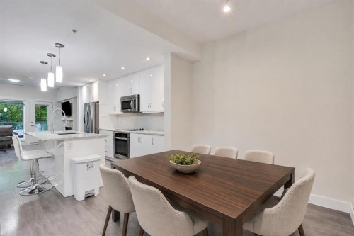 207-20 Brentwood Common Nw, Calgary, AB - Indoor Photo Showing Dining Room