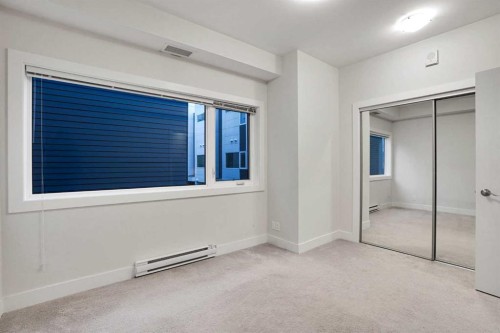 207-20 Brentwood Common Nw, Calgary, AB - Indoor Photo Showing Other Room