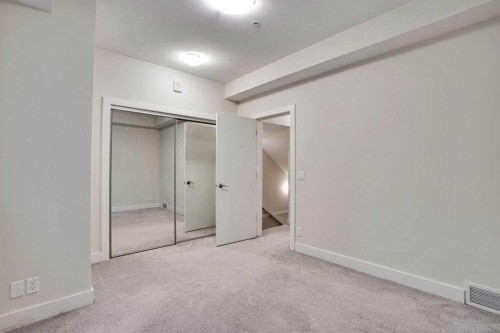 207-20 Brentwood Common Nw, Calgary, AB - Indoor Photo Showing Other Room