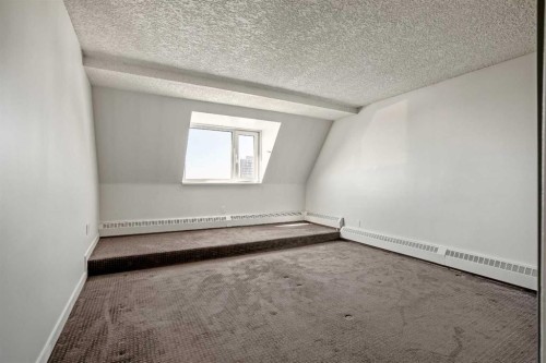 2911-221 6 Avenue Se, Calgary, AB - Indoor Photo Showing Other Room