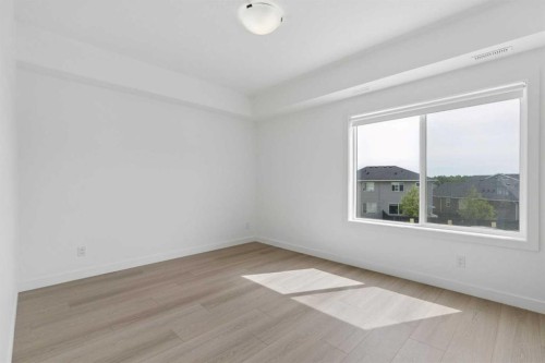 1001-24 Rivercrest Drive, Cochrane, AB - Indoor Photo Showing Other Room